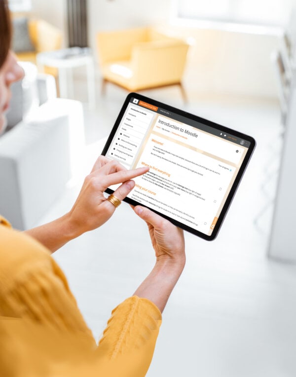 Woman using Moodle on a tablet